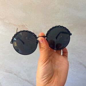 Black CHANEL round sunglasses with leather ribbon detail. Hand-me-down from mom!